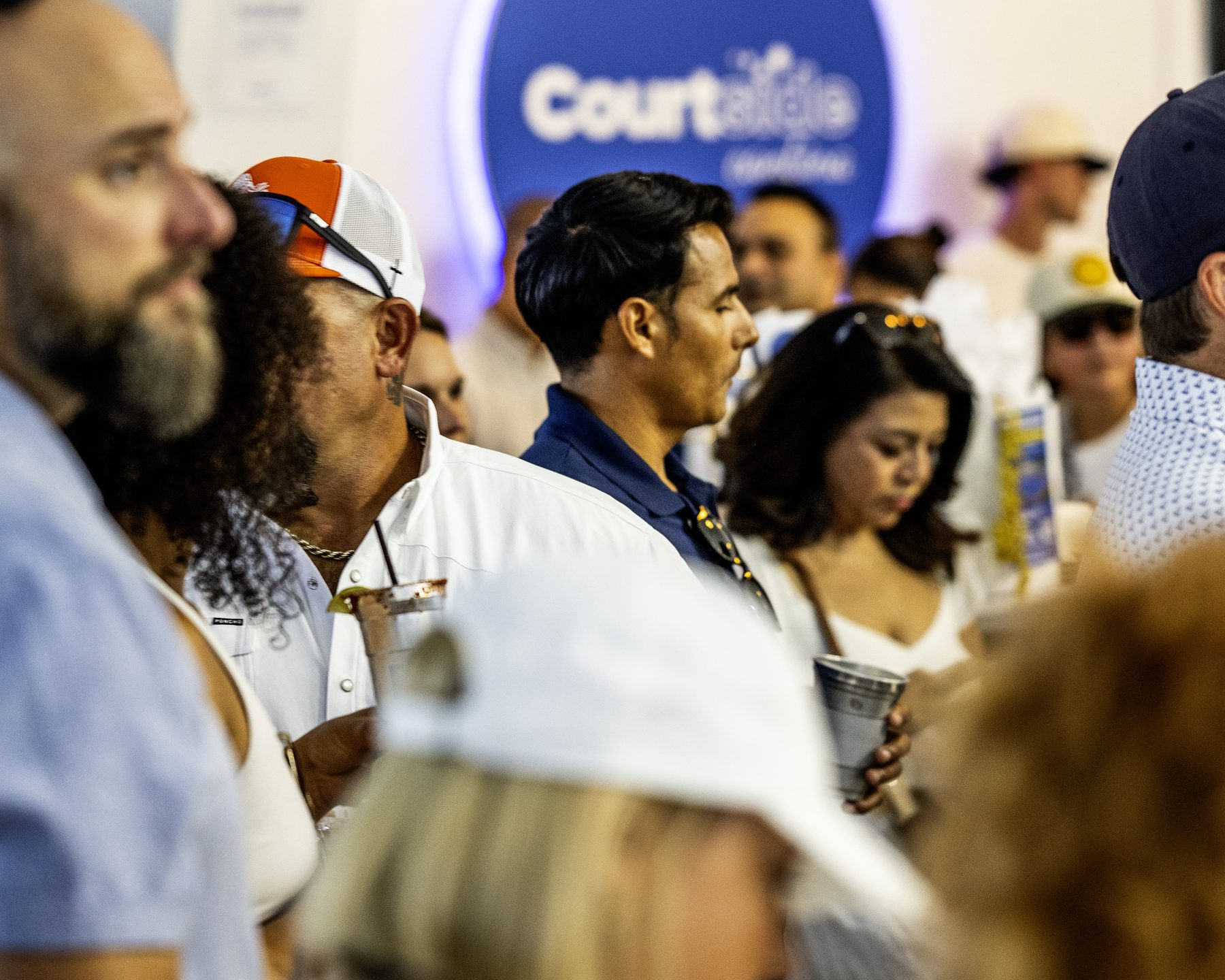 Guests filling Courtside Cantina during a private event at RacFit in Buda, Texas