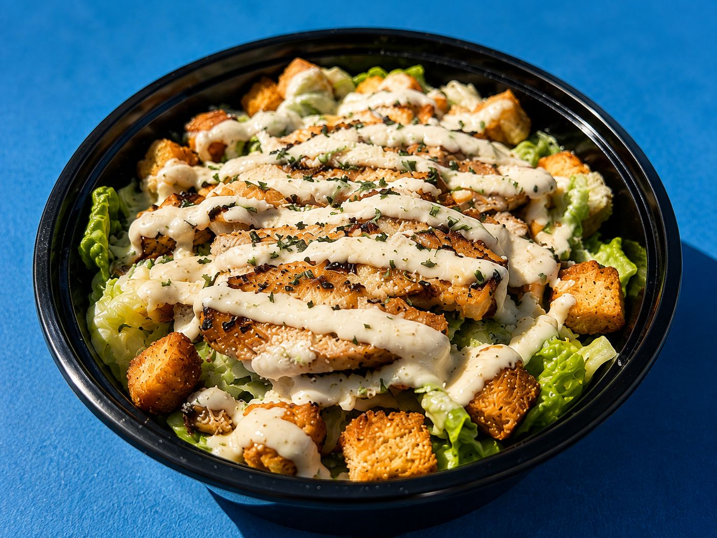 Grilled chicken Caesar salad from Yachties at RacFit in Buda, Texas